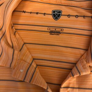 Nike Men's Polo in Orange with Black Stripes